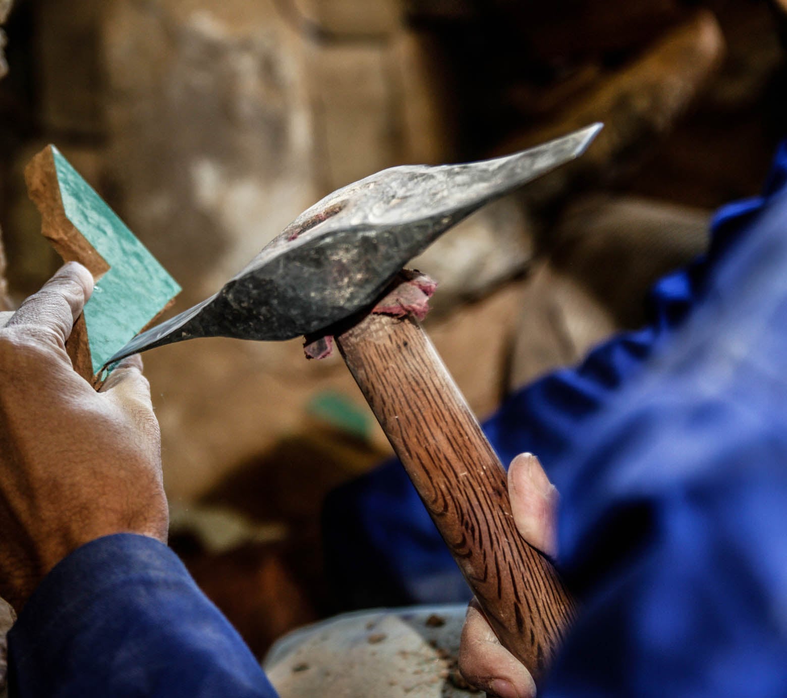 A Villa Lagoon Tile artisan creates individual details